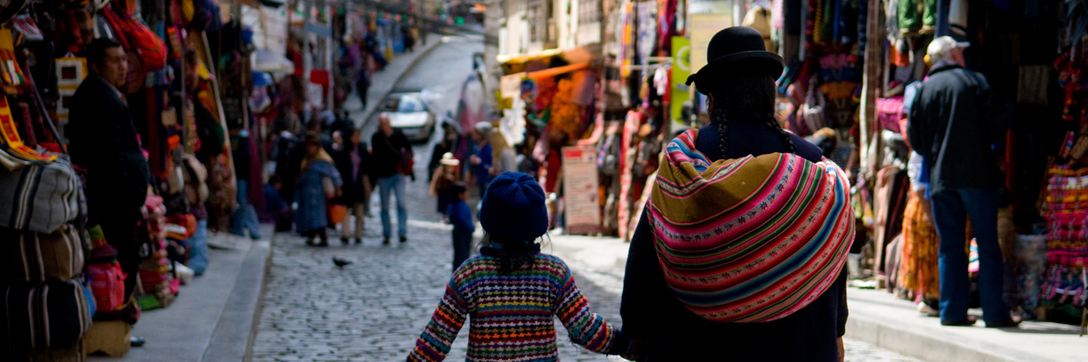 la paz bolivia - women at stalls in witches market